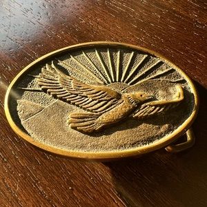 Vintage BTS solid brass flying eagle belt buckle. Made in USA